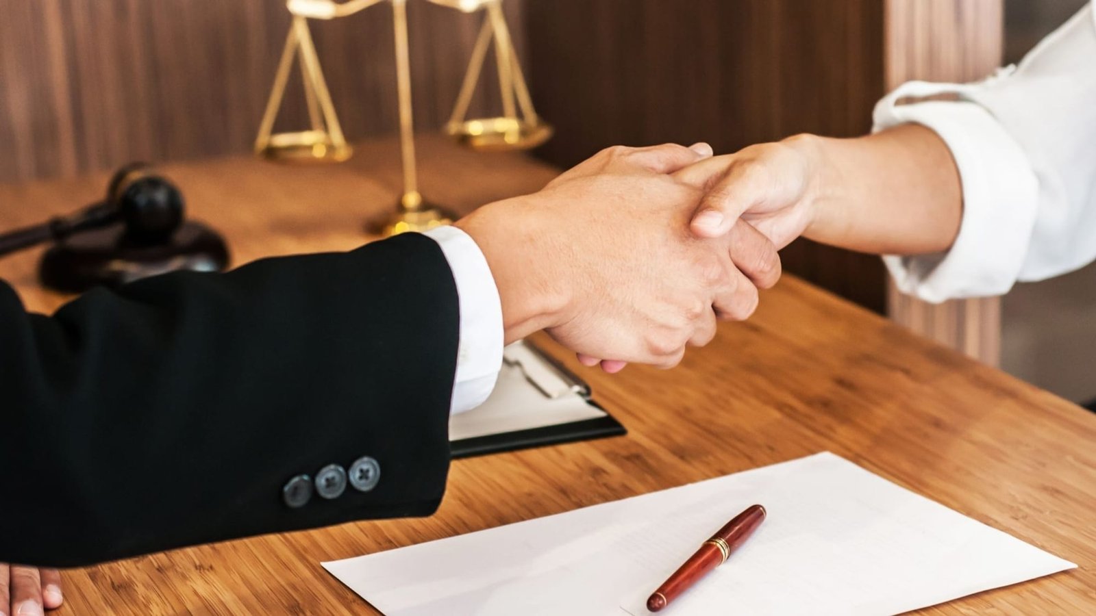 Pinellas County estate planning attorney handshake with St. Petersburg and Clearwater client